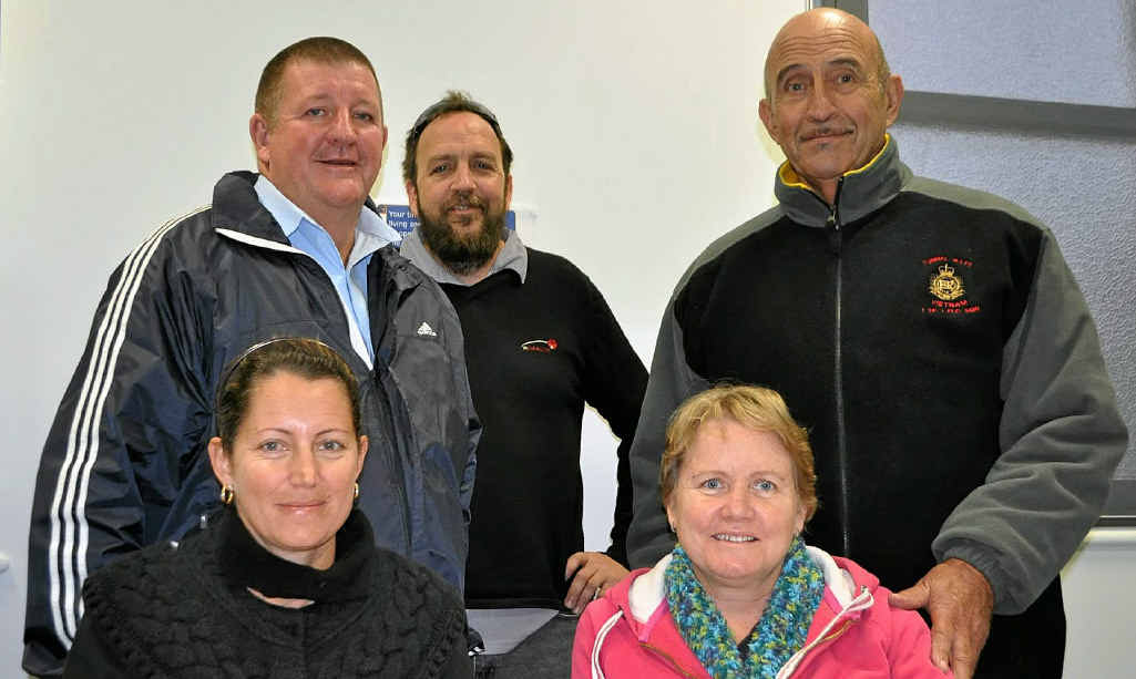 Warwick R U OK Day (from back left) director Andrew Grafton, mental health officer Mark Goddard, director Johno Felton, (front) Cr Jo McNally and secretary Ann Felton prepare to brainstorm.